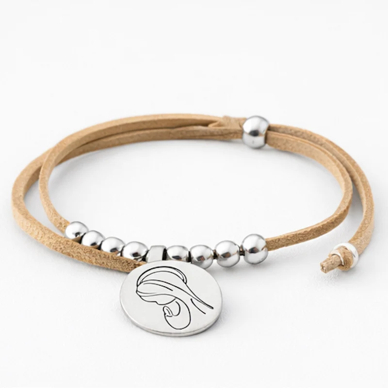 Pulsera virgencita cuerda natural en bolsa