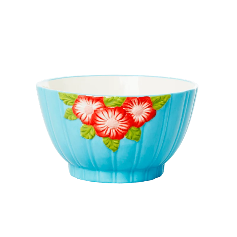Bol de cerámica turquesa con flores rojas