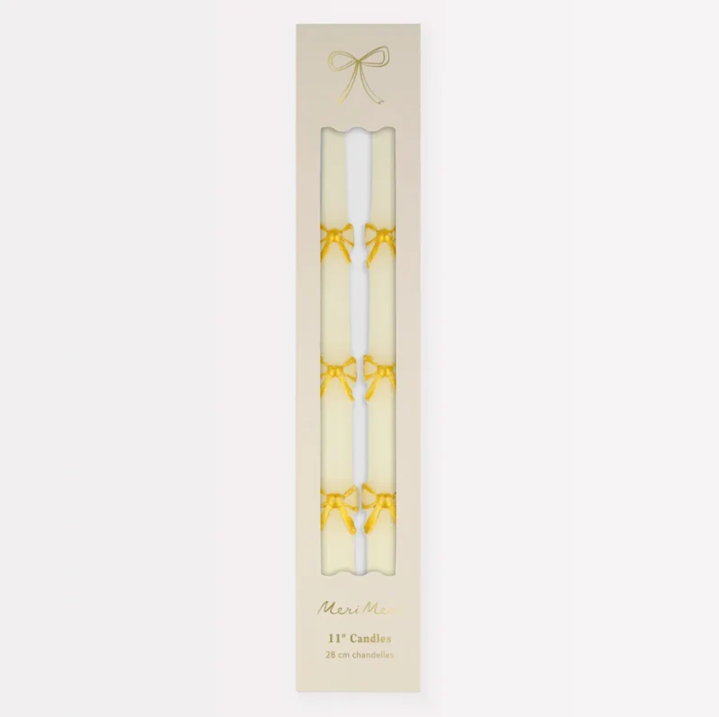 Conjunto de velas longas com arco dourado