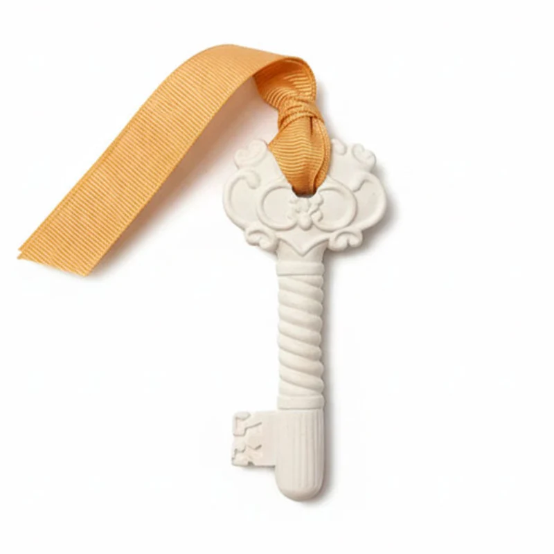 Detalle perfumado Llave cinta mostaza
